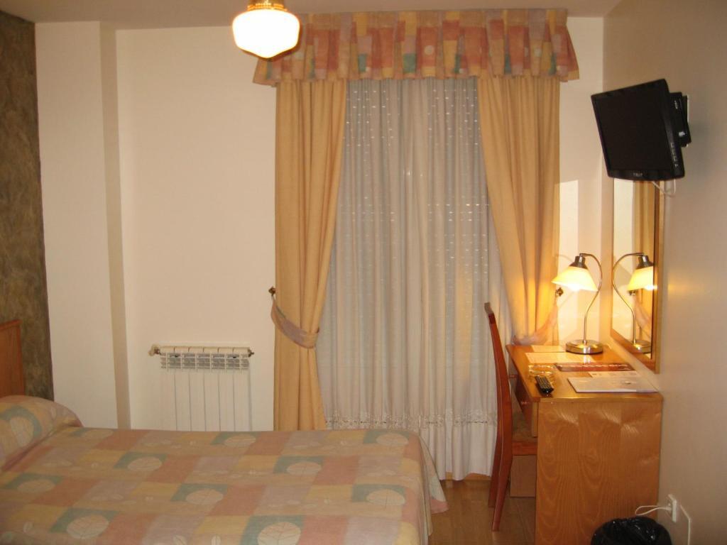 Hotel Camargo Igollo Номер фото